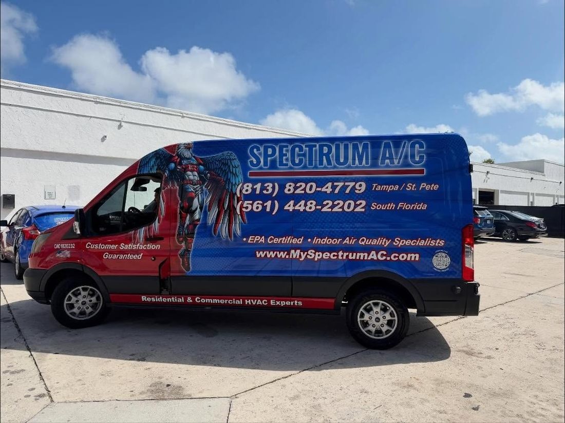 Spectrum A/C cargo van with a full-colour wrap